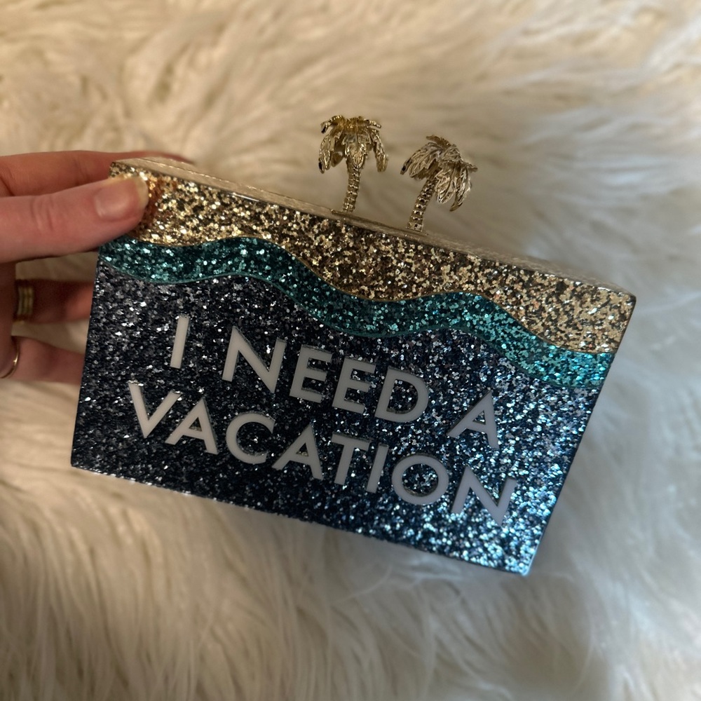 Kate Spade I need a vacation clutch